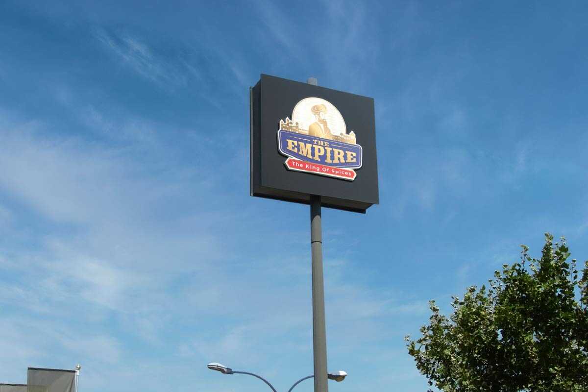 Outdoor Advertisement poll with spice brand logo Outdoor Advertisement poll with spice brand logo